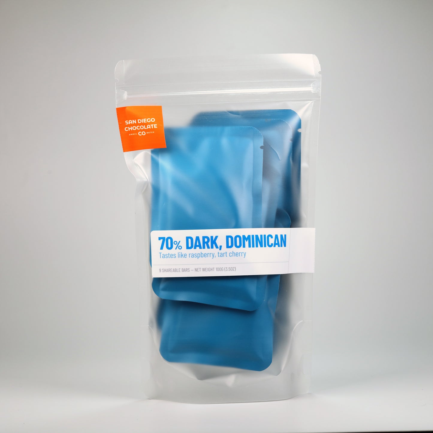 Packaged blue chocolate with 'San Diego Chocolate' label on a gray background