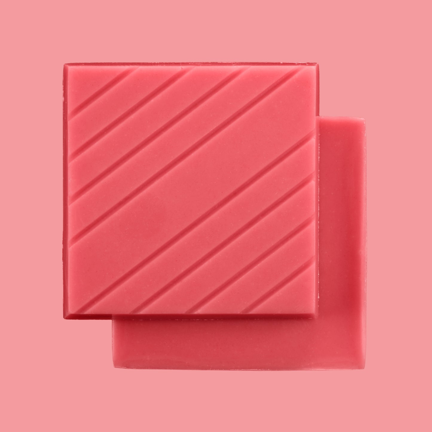 pink raspberry chocolate bars on a pink background