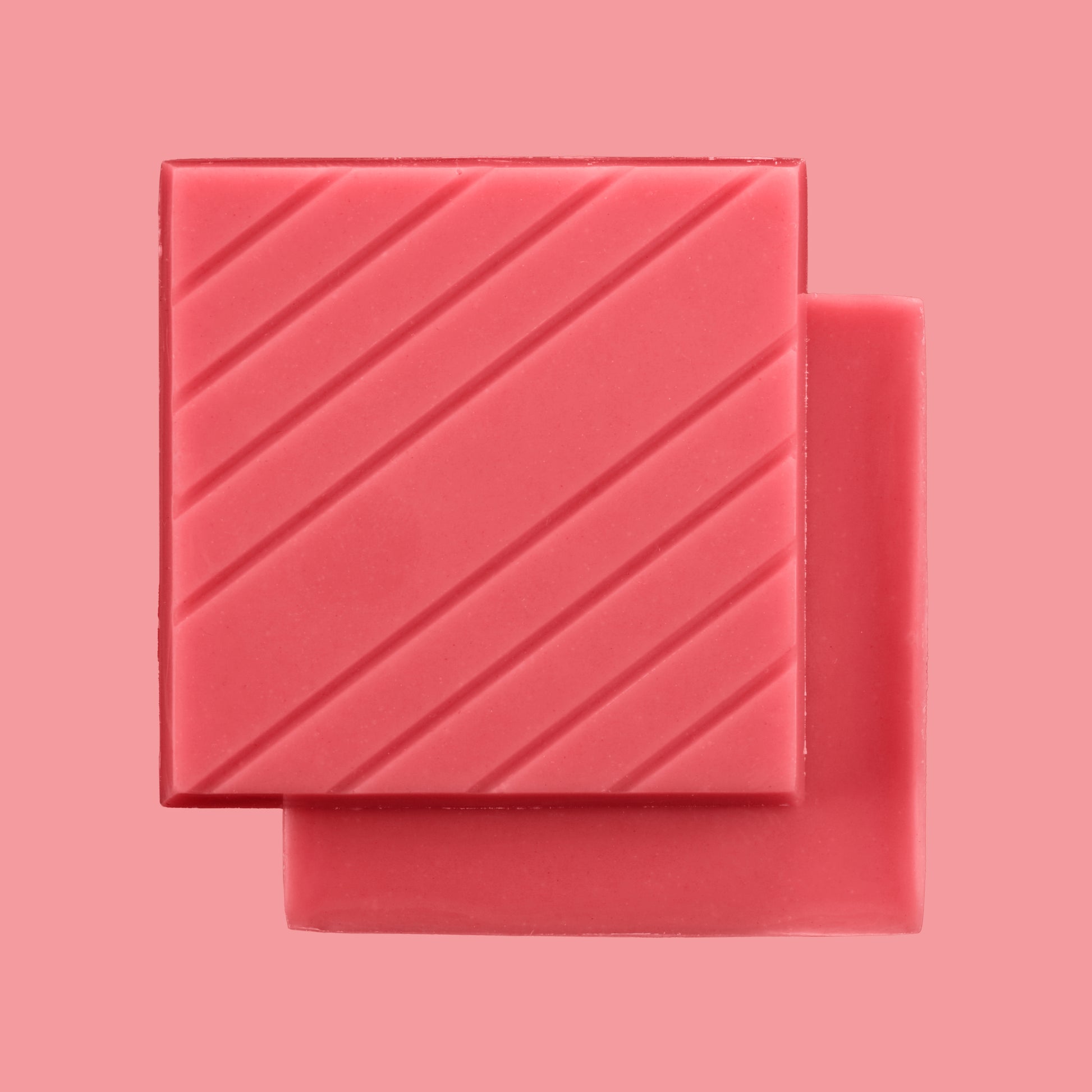 pink raspberry chocolate bars on a pink background